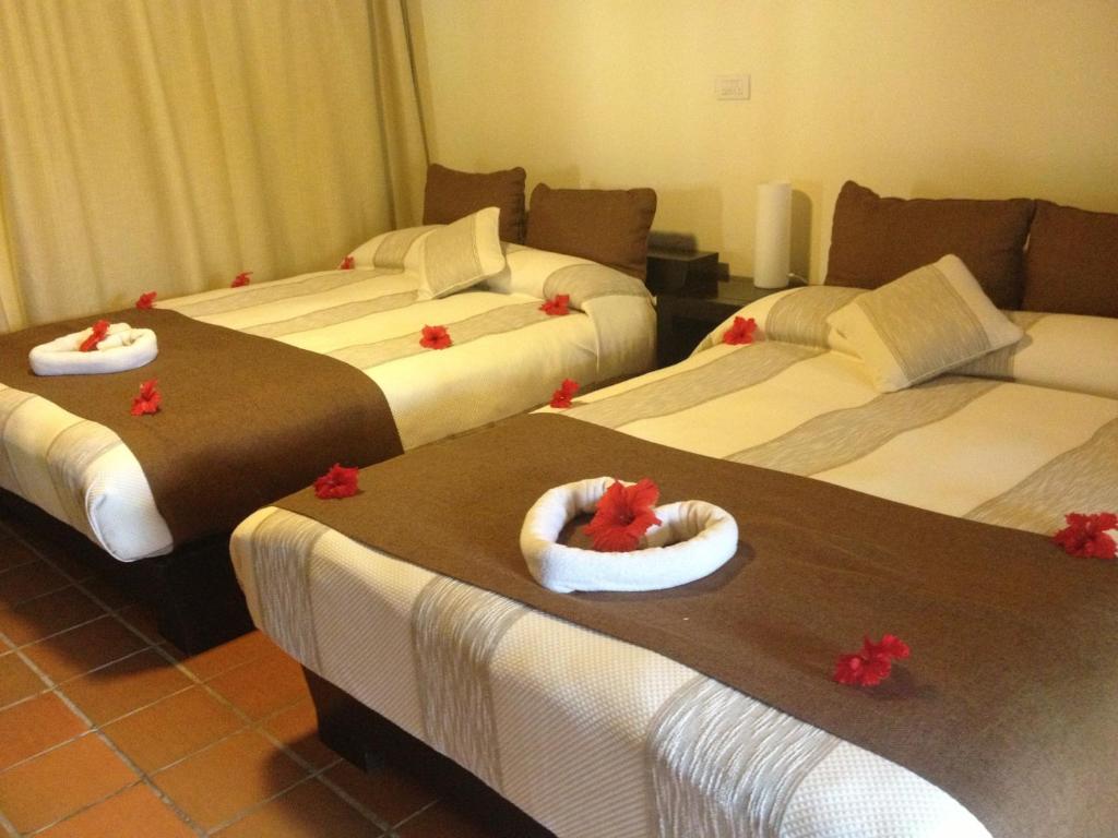 Postel nebo postele na pokoji v ubytování Media Luna Resort & Spa
