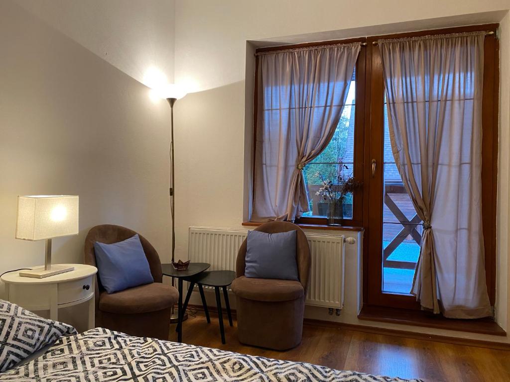 Postel nebo postele na pokoji v ubytování Penzion Gabriel