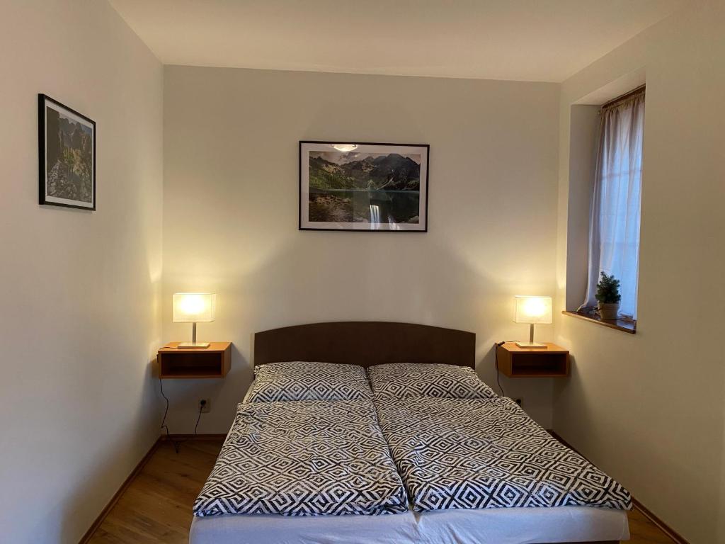 Postel nebo postele na pokoji v ubytování Penzion Gabriel