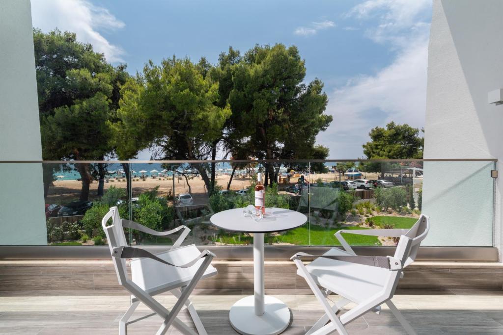 A balcony or terrace at Lagomandra Luxury Suites with Private Pools