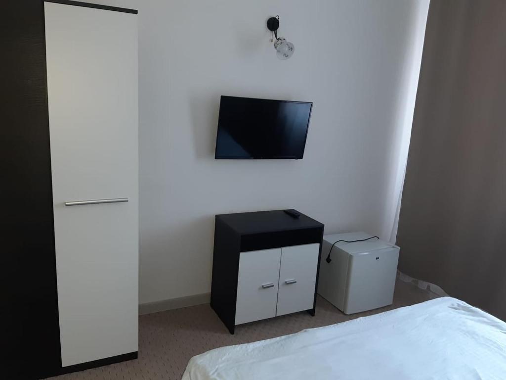 TV a/nebo společenská místnost v ubytování CASABLANCA