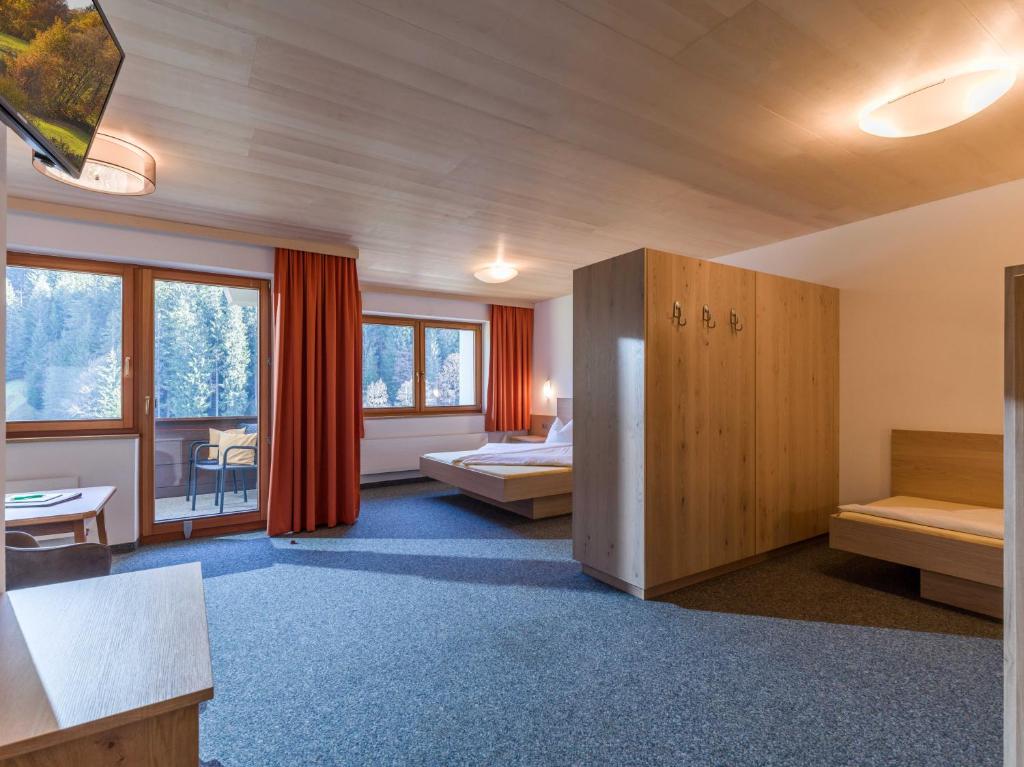 Postel nebo postele na pokoji v ubytování Haus am Wildbach