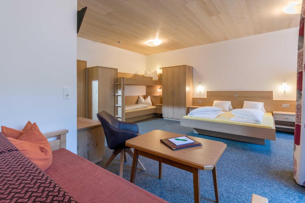 Postel nebo postele na pokoji v ubytování Haus am Wildbach