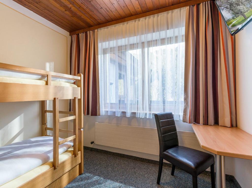 Postel nebo postele na pokoji v ubytování Haus am Wildbach