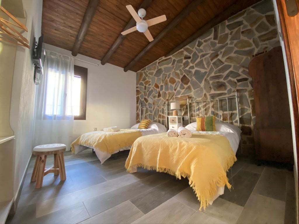Posteľ alebo postele v izbe v ubytovaní La Posada de Bartolo.