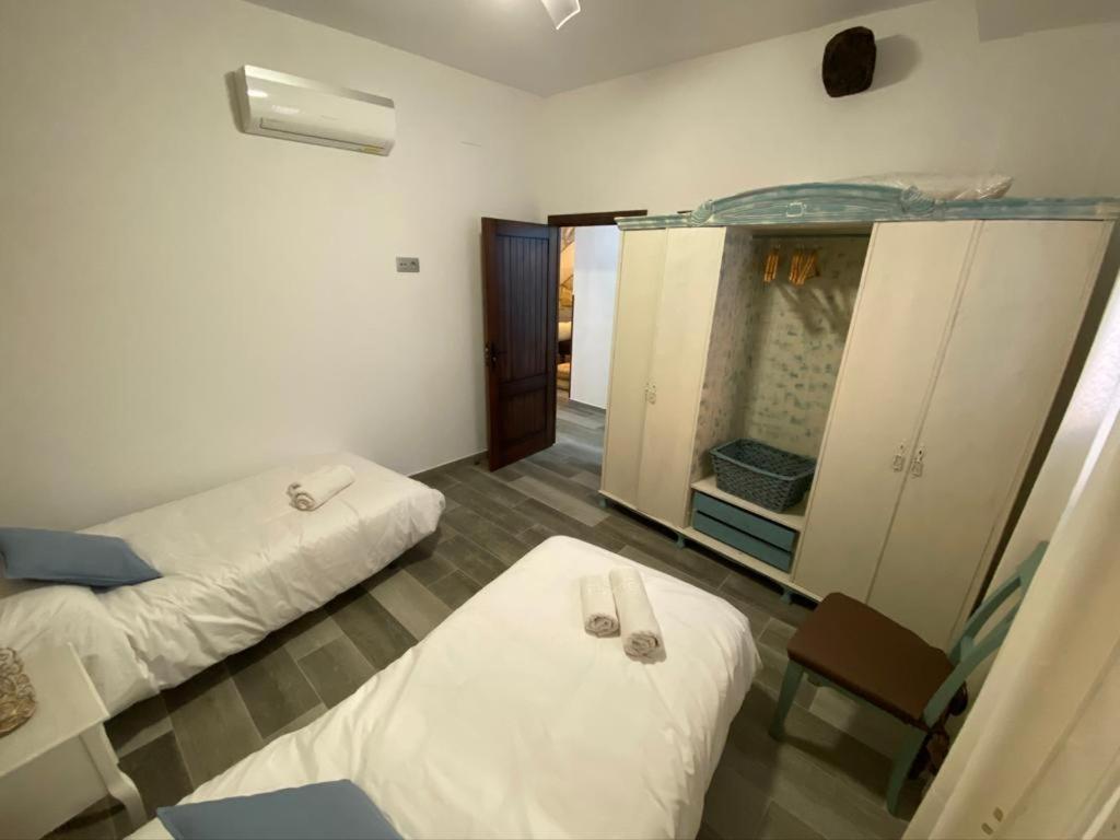 Posteľ alebo postele v izbe v ubytovaní La Posada de Bartolo.