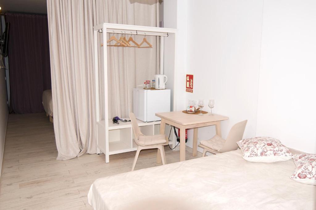 Postel nebo postele na pokoji v ubytování Loft Valentia Ifach Calpe