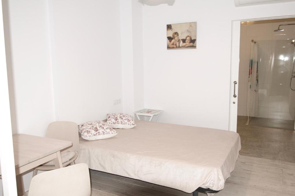 Postel nebo postele na pokoji v ubytování Loft Valentia Ifach Calpe
