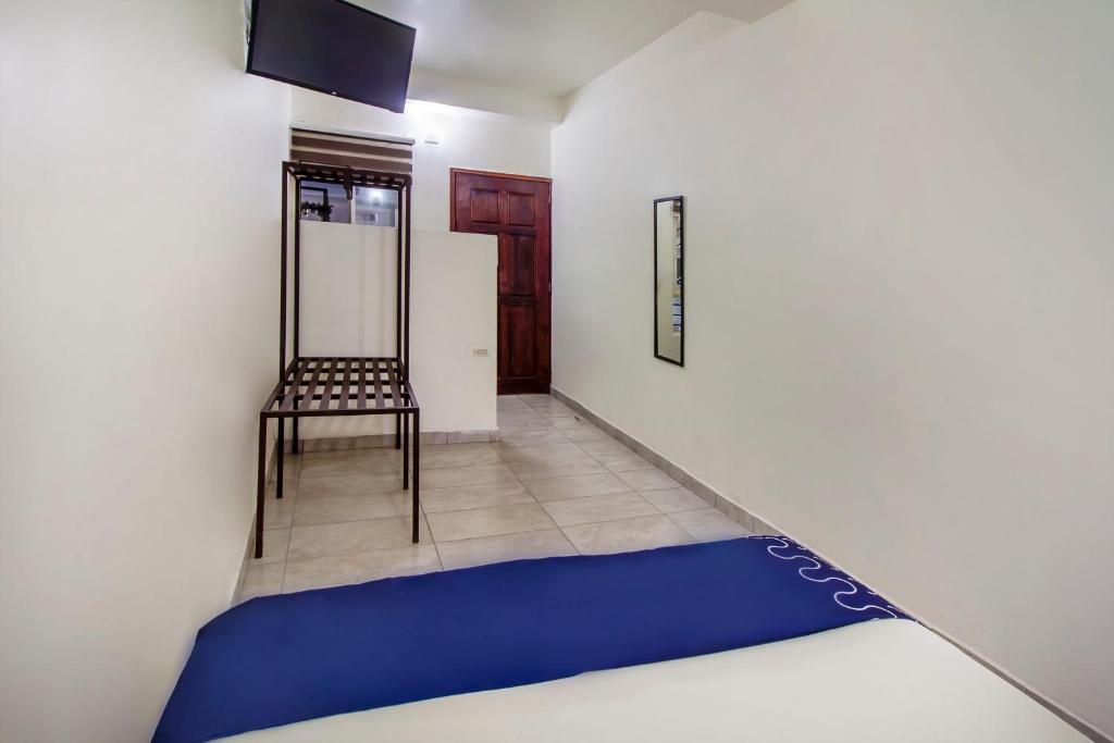 Postel nebo postele na pokoji v ubytování Hotel Plaza Galindo