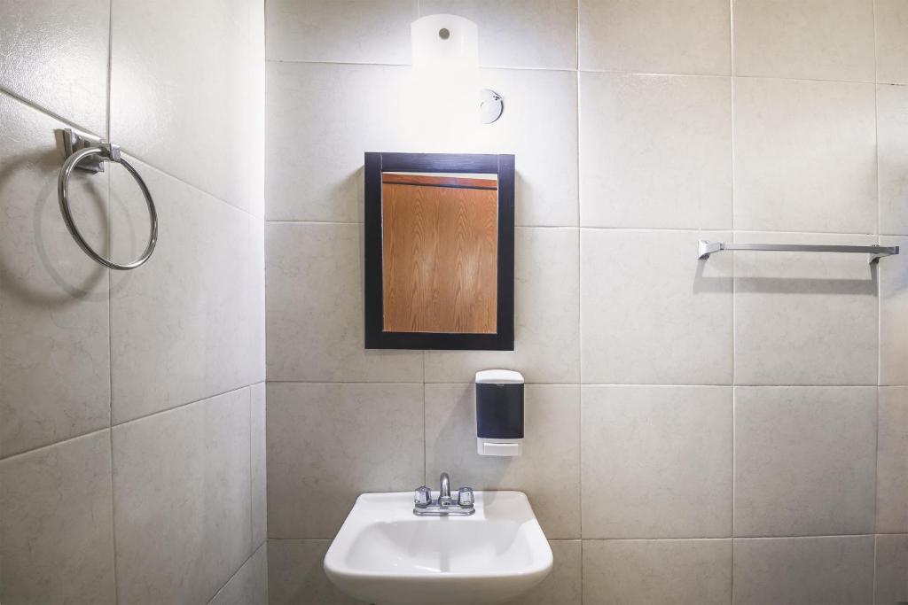 Koupelna v ubytování Hotel Plaza Galindo