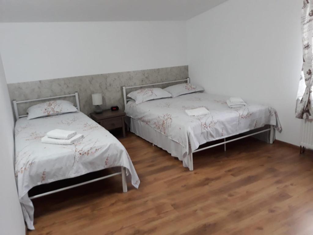 Postel nebo postele na pokoji v ubytování DNT HOUSE &spa
