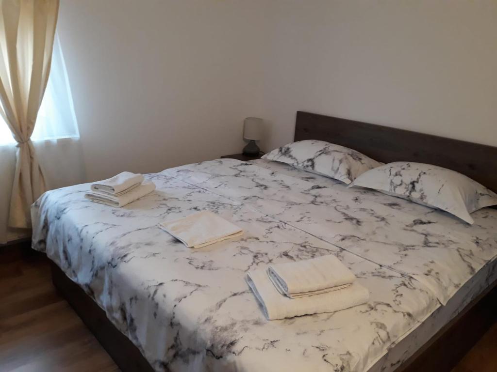 Postel nebo postele na pokoji v ubytování DNT HOUSE &spa