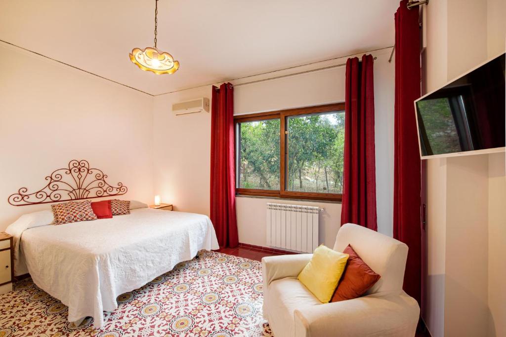Posteľ alebo postele v izbe v ubytovaní Villa Louise Sorrento