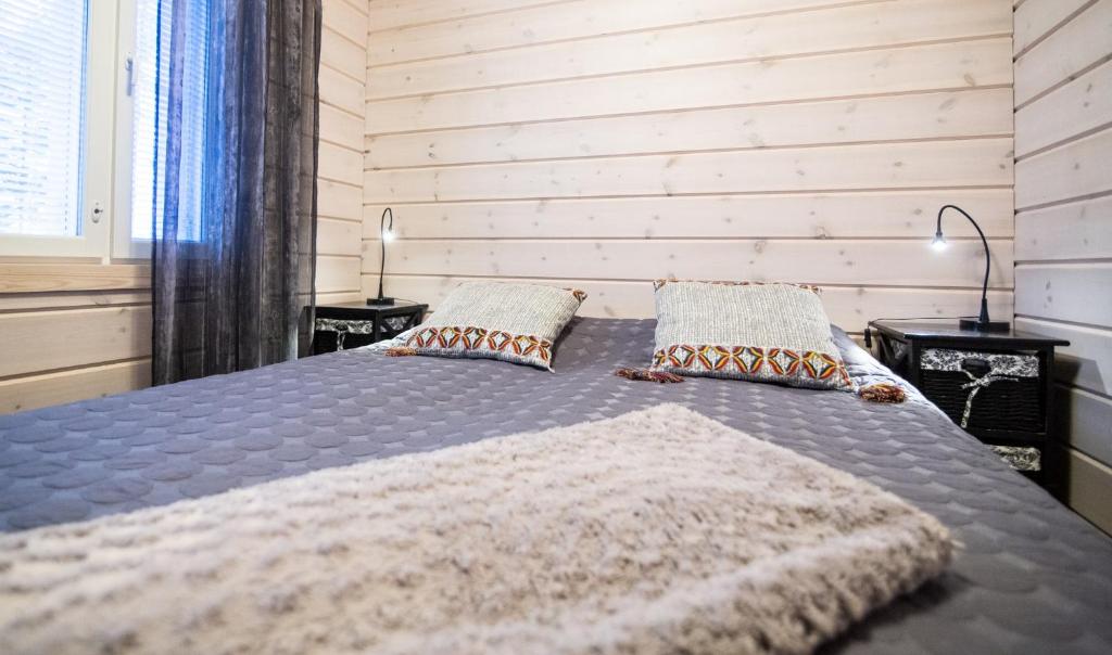 Postel nebo postele na pokoji v ubytování Ettomies II