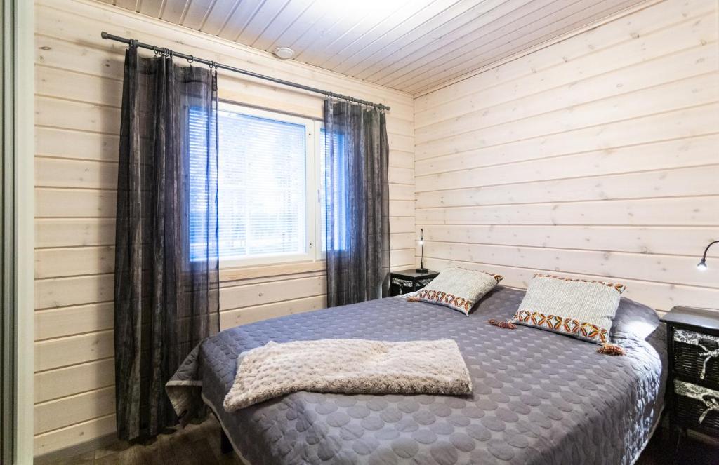 Postel nebo postele na pokoji v ubytování Ettomies II