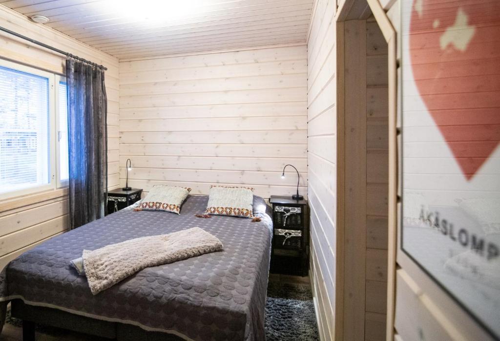 Postel nebo postele na pokoji v ubytování Ettomies II