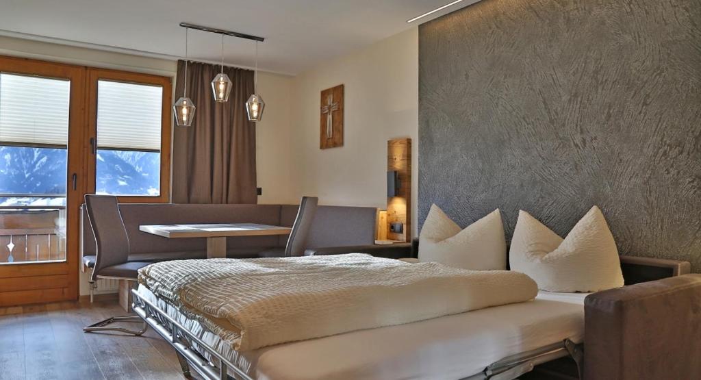Postel nebo postele na pokoji v ubytování Haus Gerda