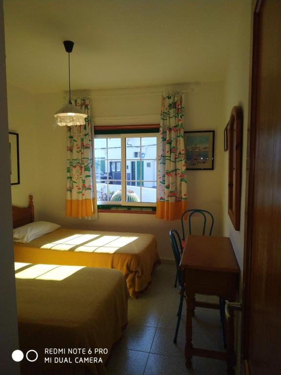 A bed or beds in a room at Caracola azul