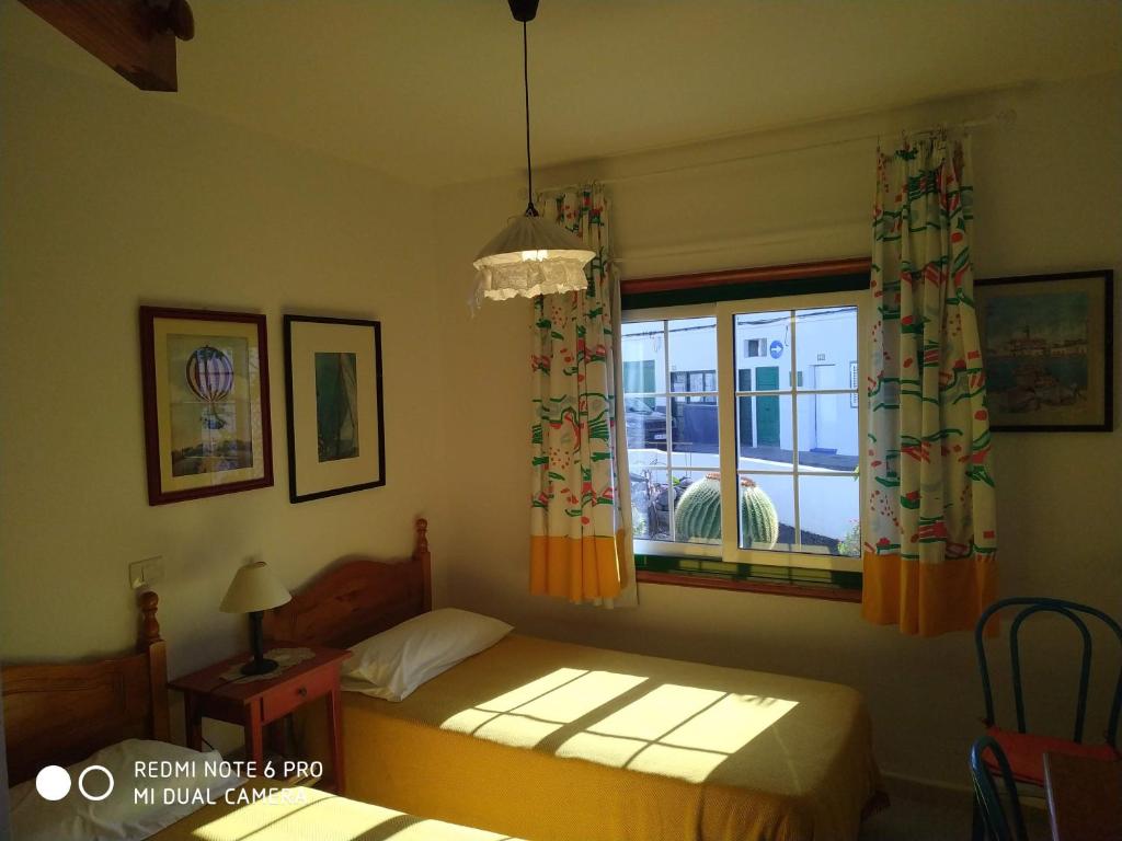 A bed or beds in a room at Caracola azul