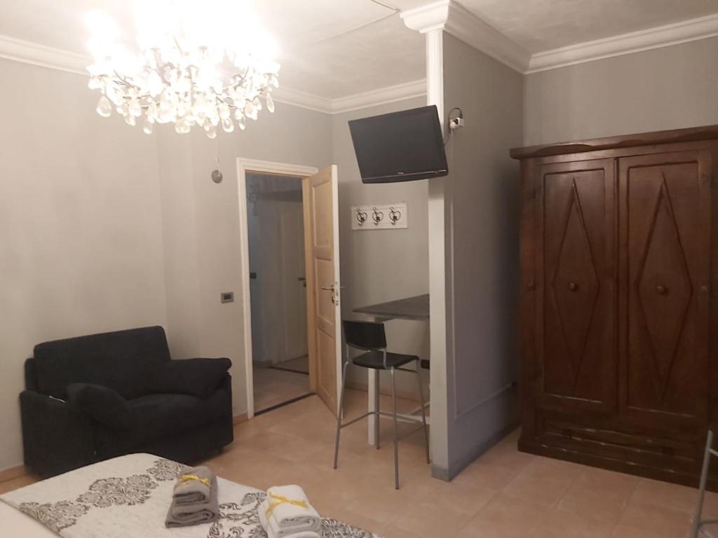 TV a/nebo společenská místnost v ubytování B&B La Corte Dei Samidagi