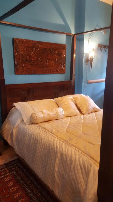 Postel nebo postele na pokoji v ubytování B&B La Corte Dei Samidagi