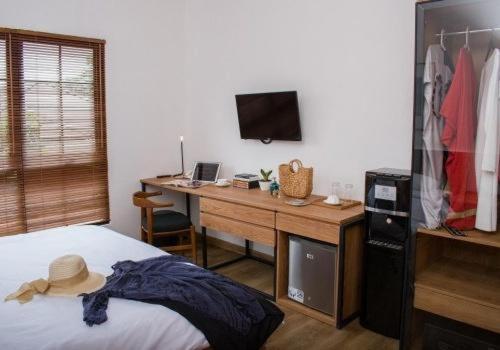 Postel nebo postele na pokoji v ubytování Rumanami Residence