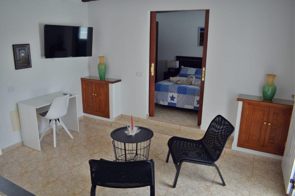 Postel nebo postele na pokoji v ubytování CA.MARCELA. 200 metros del mar.