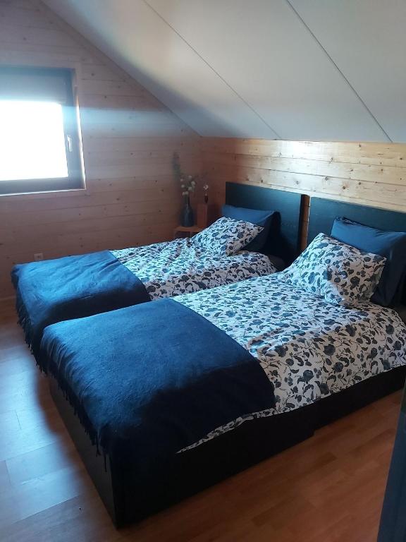 Postel nebo postele na pokoji v ubytování Le refuge Ardennais