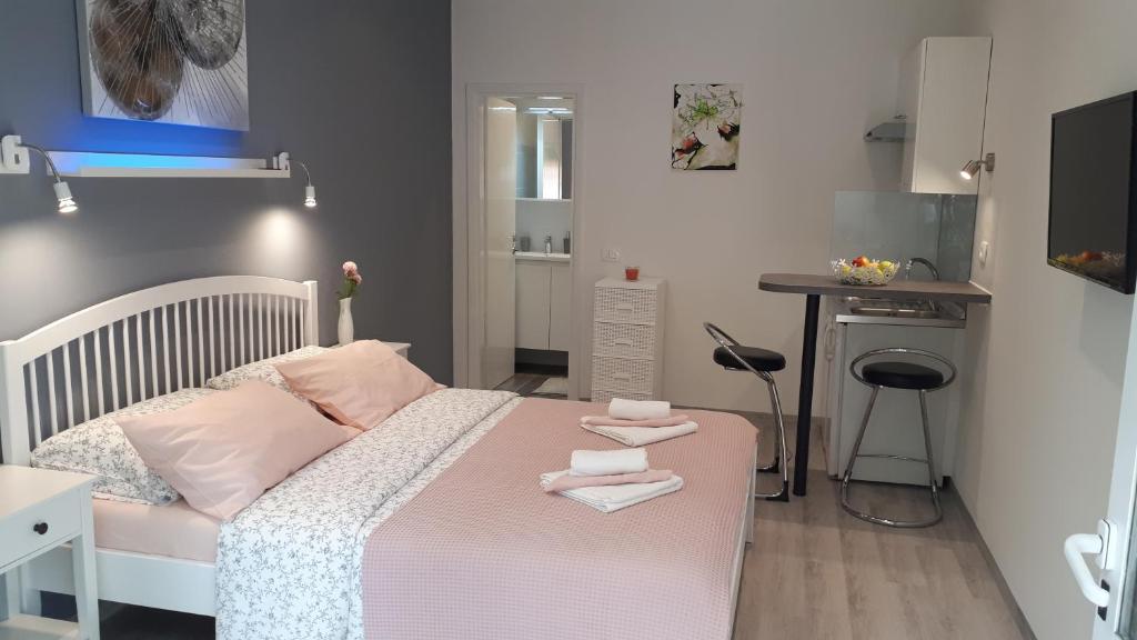 Łóżko lub łóżka w pokoju w obiekcie Guesthouse Mila
