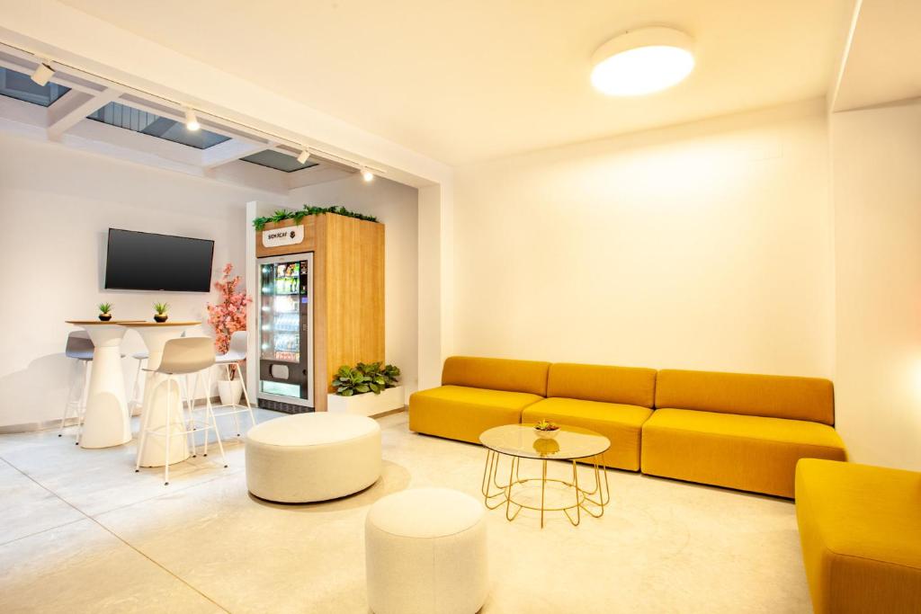 TV a/nebo společenská místnost v ubytování MyFlats Luxury Downtown
