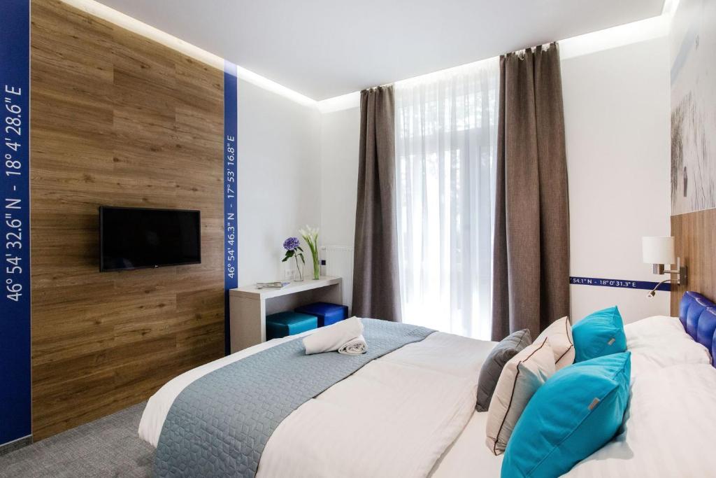 Postel nebo postele na pokoji v ubytování Hotel Solero