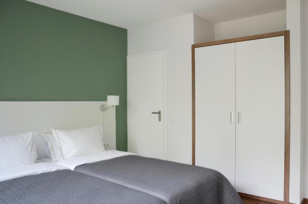 Postel nebo postele na pokoji v ubytování Tip Tap Guest House
