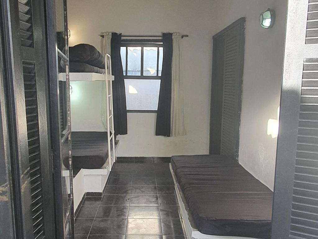  Casa com piscina de frente pro mar