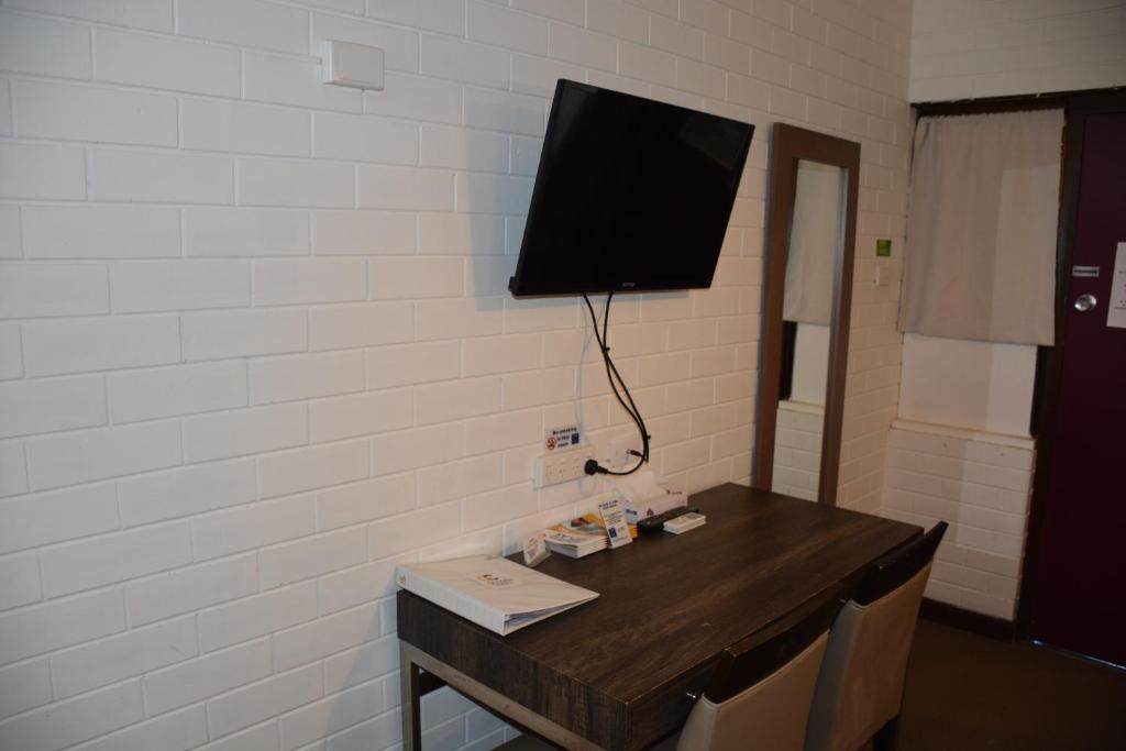 TV a/nebo společenská místnost v ubytování Angaston Vineyards Motel
