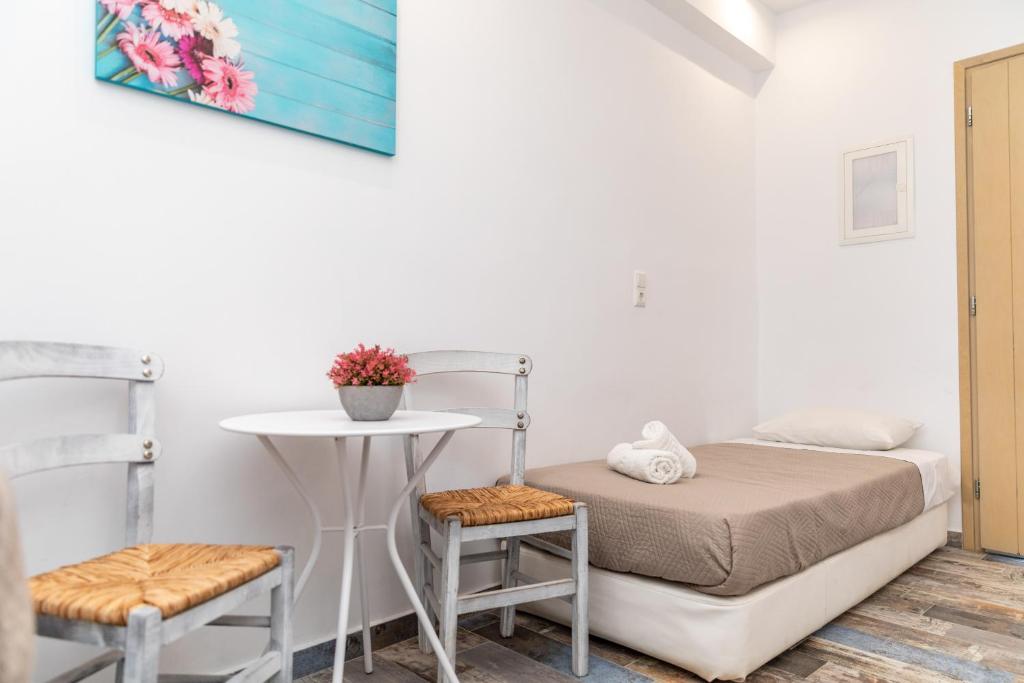 Postel nebo postele na pokoji v ubytování Depis Luxury Suites