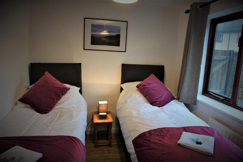 Postel nebo postele na pokoji v ubytování Palmers Apartment A