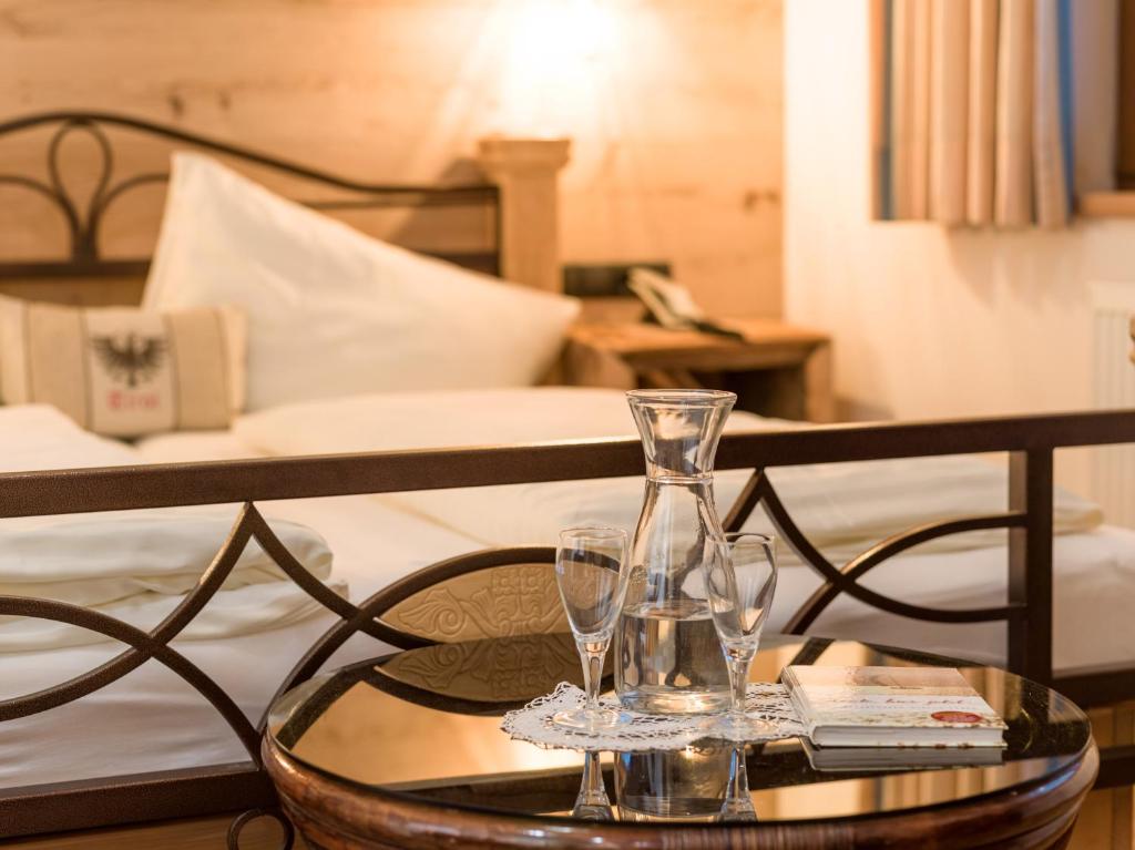 Postel nebo postele na pokoji v ubytování Hotel Gasthof Felsenkeller