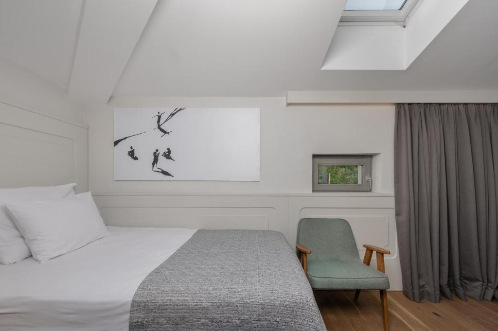 Postel nebo postele na pokoji v ubytování Hotel Peteani