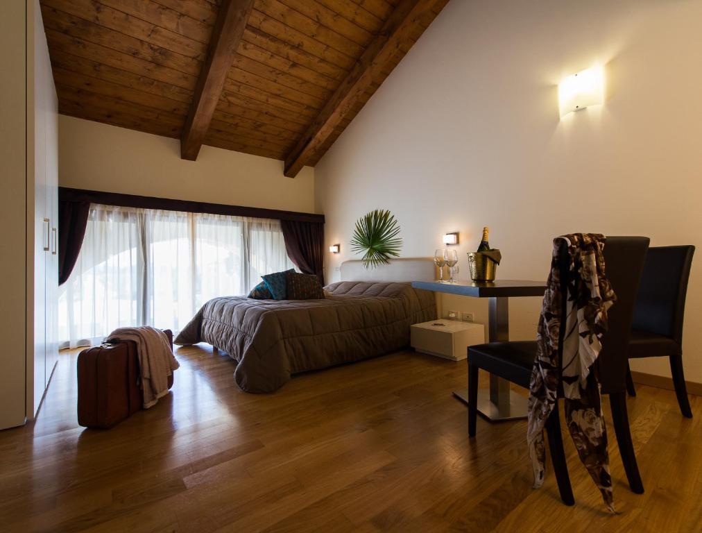 Postel nebo postele na pokoji v ubytování Residence Cà Beregana