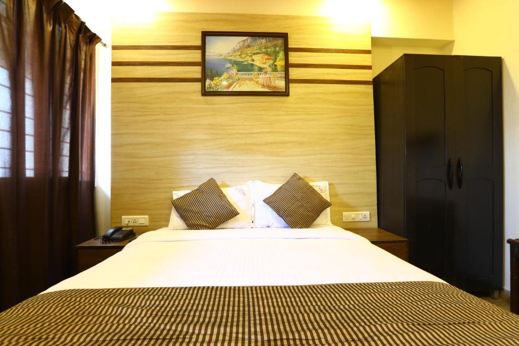 Postel nebo postele na pokoji v ubytování Hotel Sona