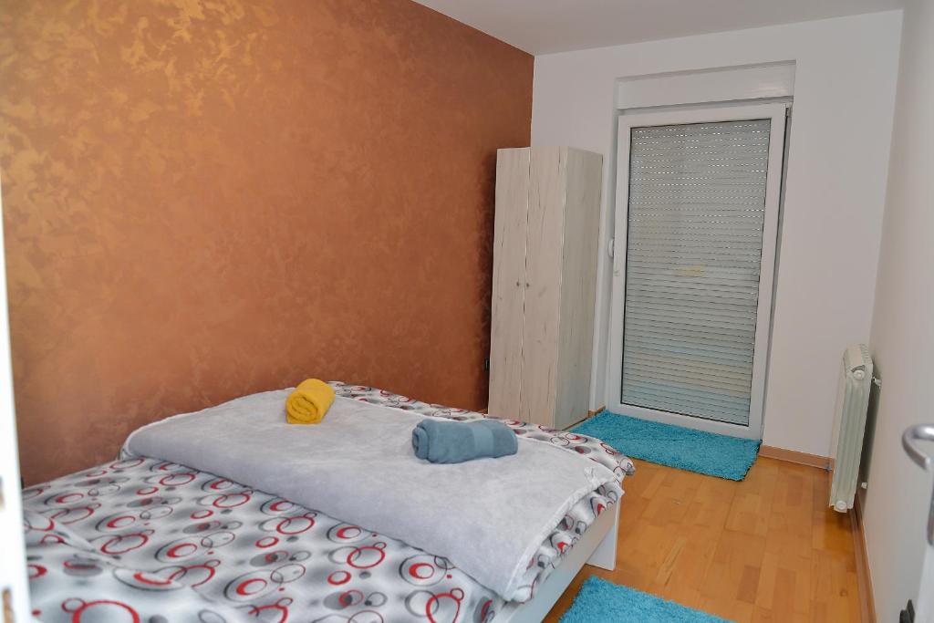 Lova arba lovos apgyvendinimo įstaigoje Apartman Vukovic
