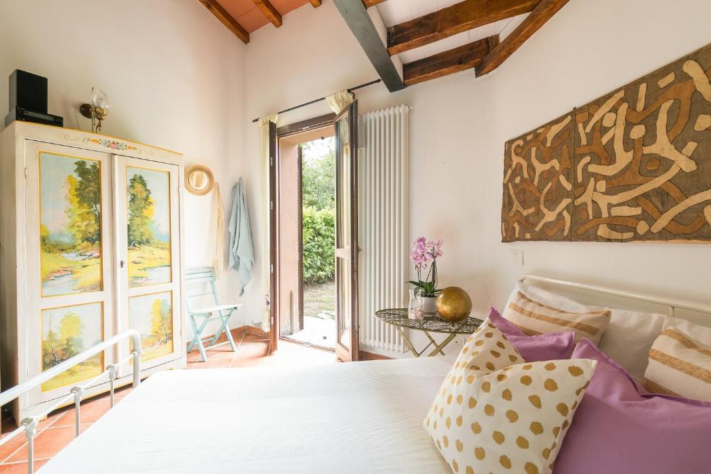 Postel nebo postele na pokoji v ubytování Casina di Dario - Pet Friendly