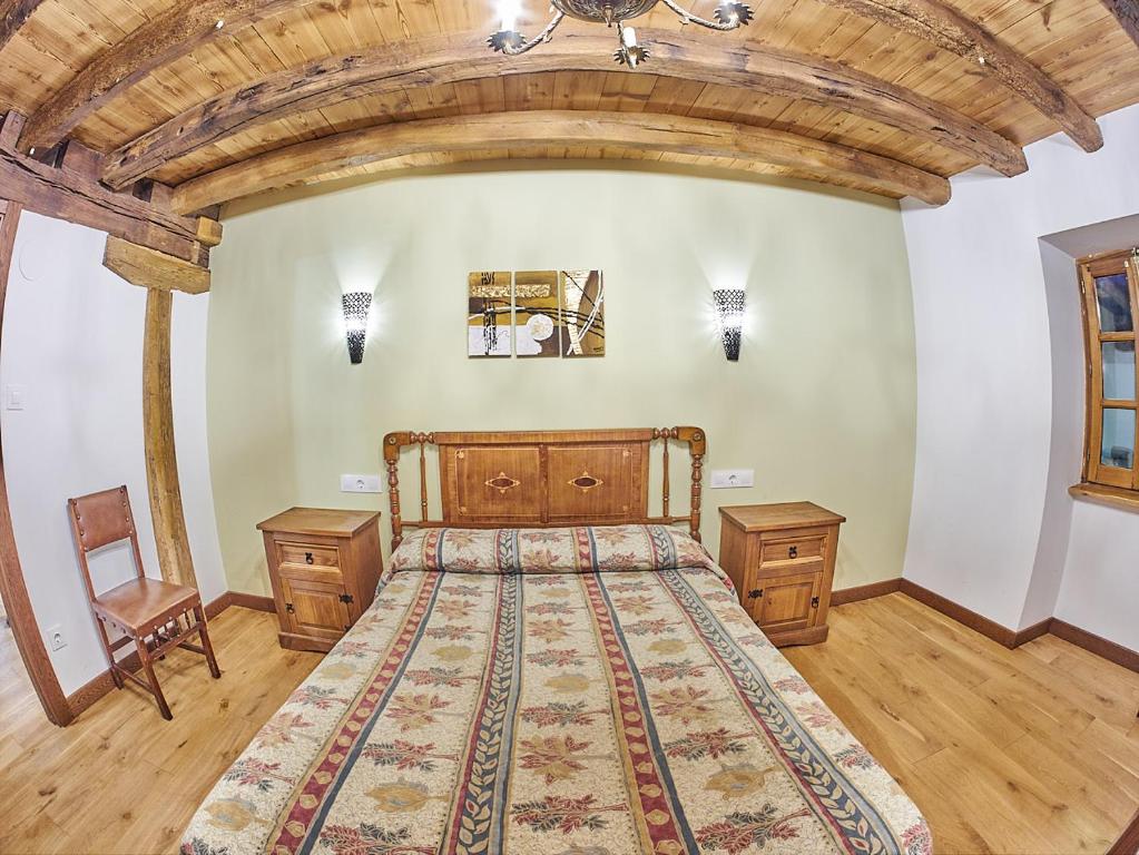 Postel nebo postele na pokoji v ubytování Casa Rural Lenco