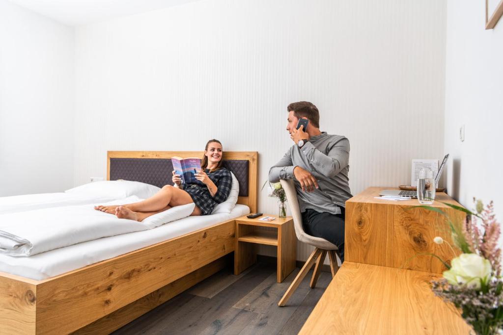 Postel nebo postele na pokoji v ubytování Motel Keckeis Inn - Self Check-in