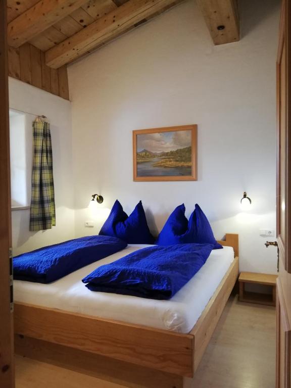 Postel nebo postele na pokoji v ubytování Scheffauerhof