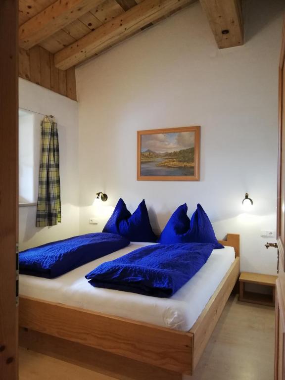 Postel nebo postele na pokoji v ubytování Scheffauerhof