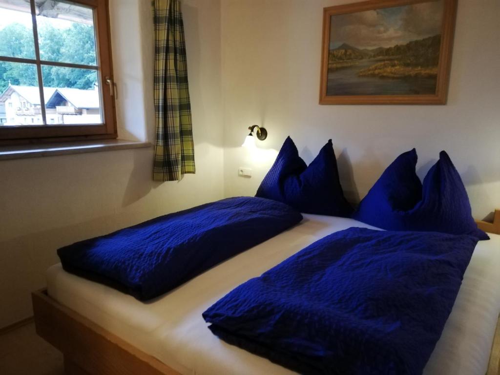 Postel nebo postele na pokoji v ubytování Scheffauerhof