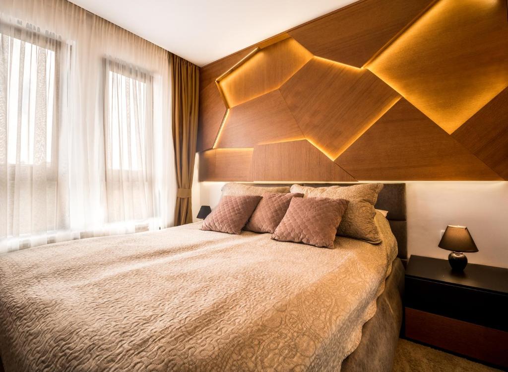 Postel nebo postele na pokoji v ubytování Apartman 23 - Vila Harizma