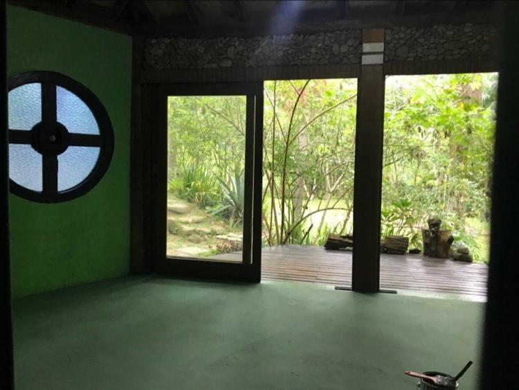 Casa com piscina de cachoeira  Casa com piscina de cachoeira