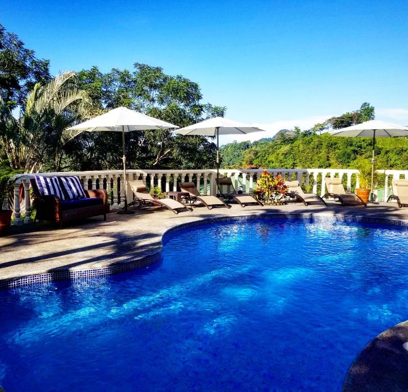 Bazén v ubytování Mango Tree Villas nebo v jeho okolí